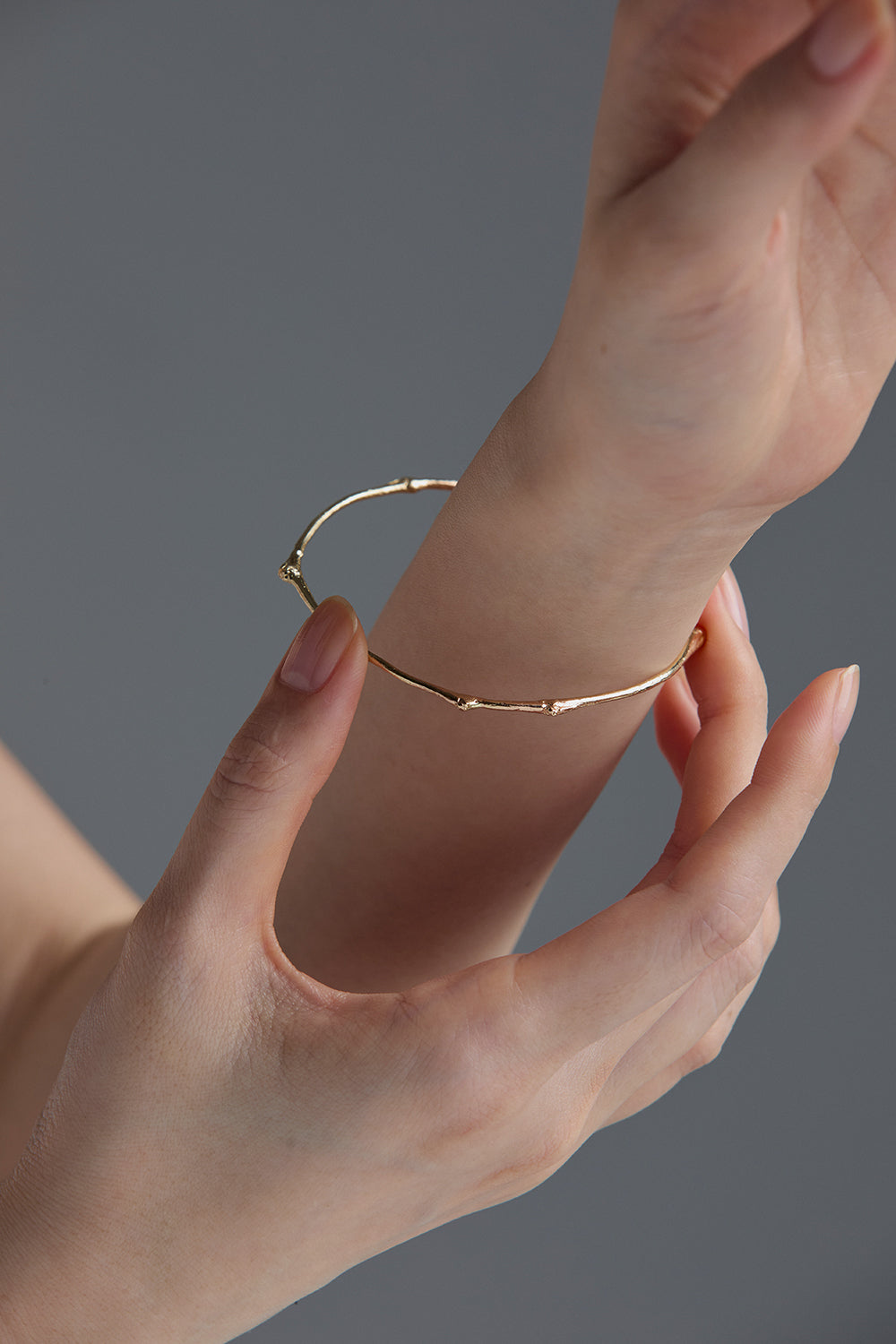 GOLD TWIG BANGLE